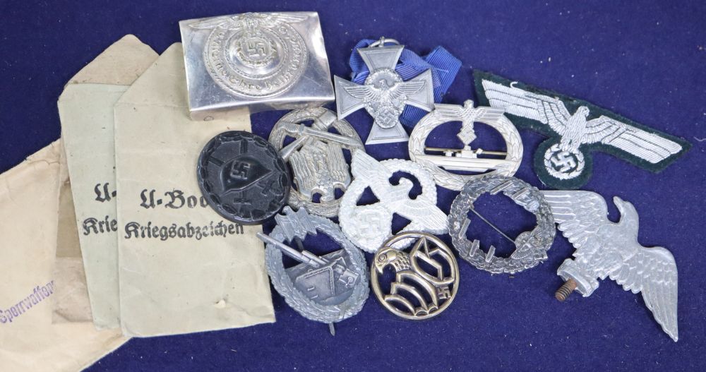 A collection of mixed badges and medals